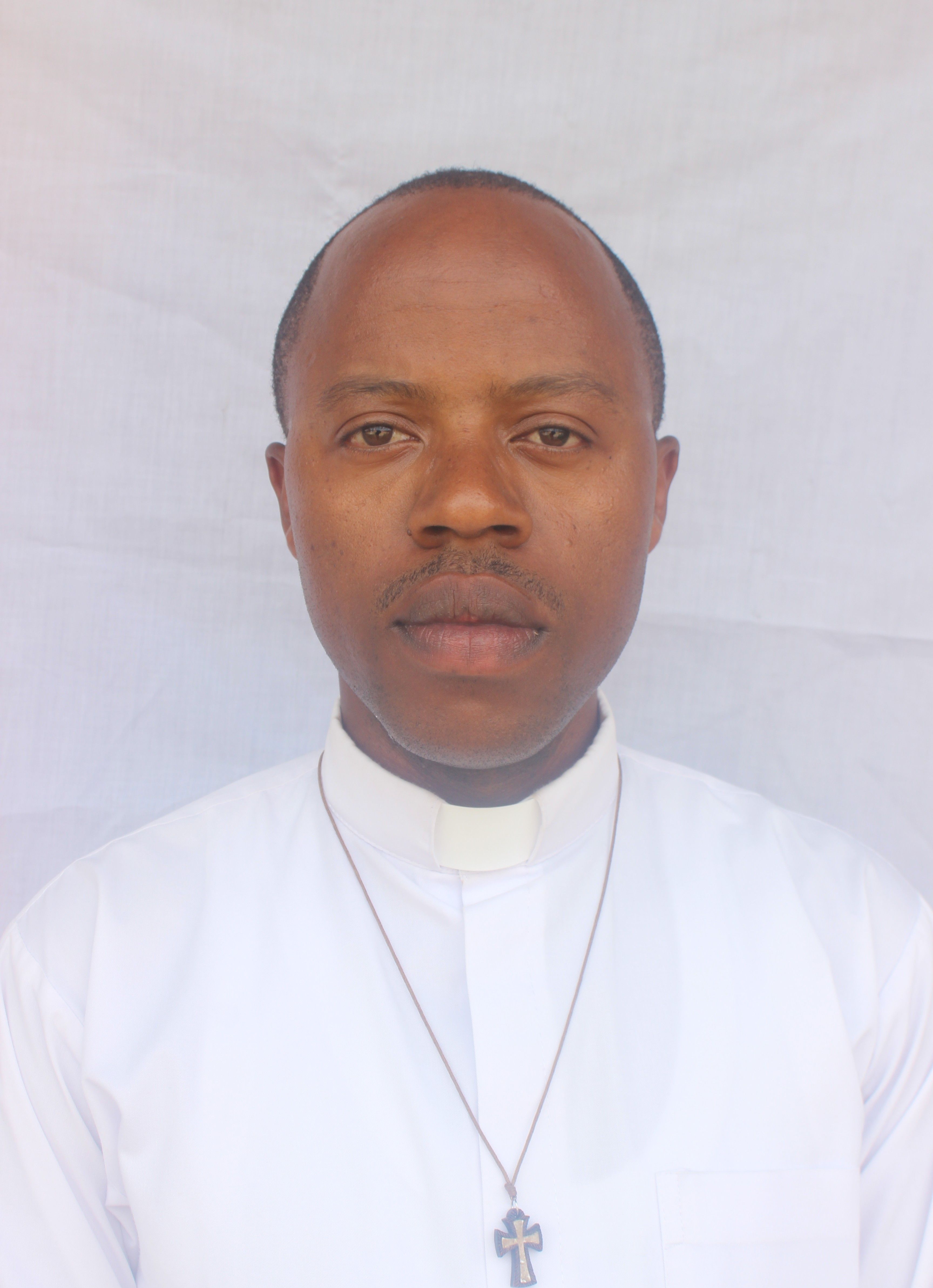 School Principal, Father Karangwa Evariste